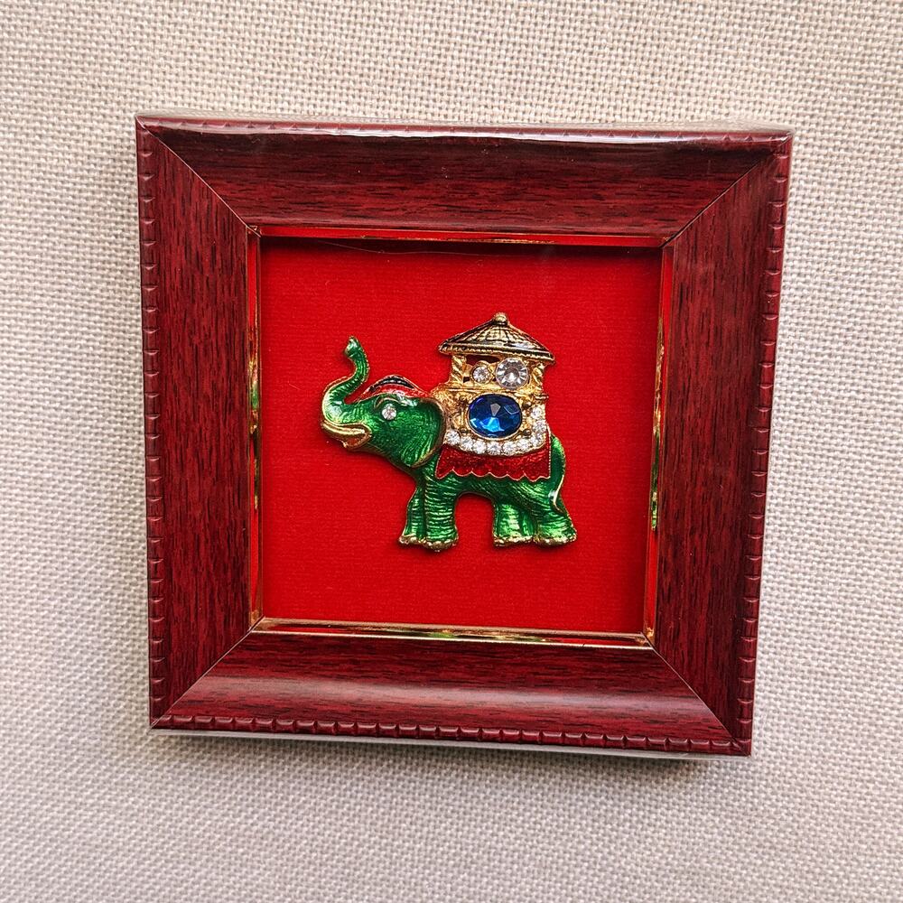 Green Elephant with Gilded Rider, Red Lacquer Frame